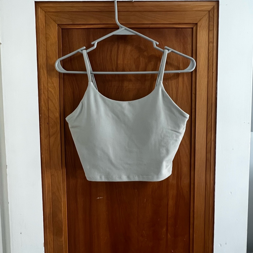 Muted green athletic top